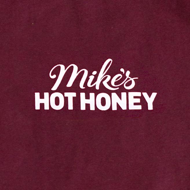 Mike's Hot Honey logo on red shirt