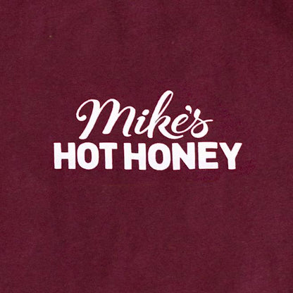 Mike's Hot Honey logo on red shirt